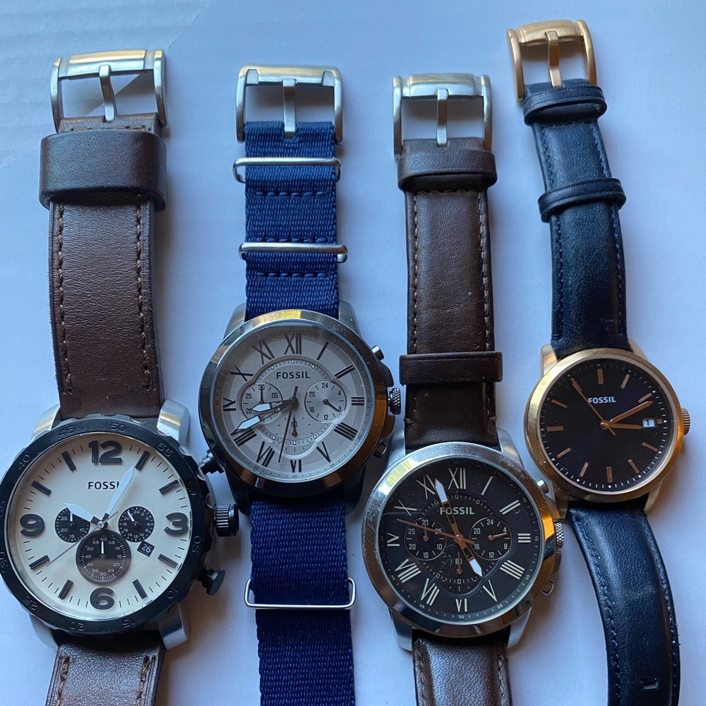 4 Fossil Watches and 17 extra straps Retail $700